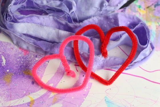 2 heart shaped pipe cleaners and fabric strips