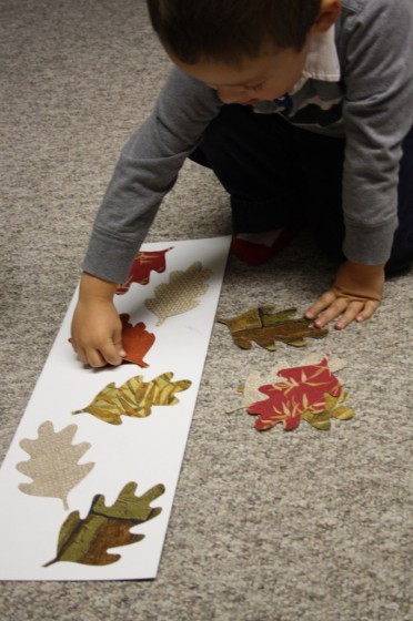 Toddler matching fall leaf shapes