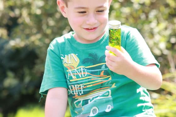 happy child with glitter jar