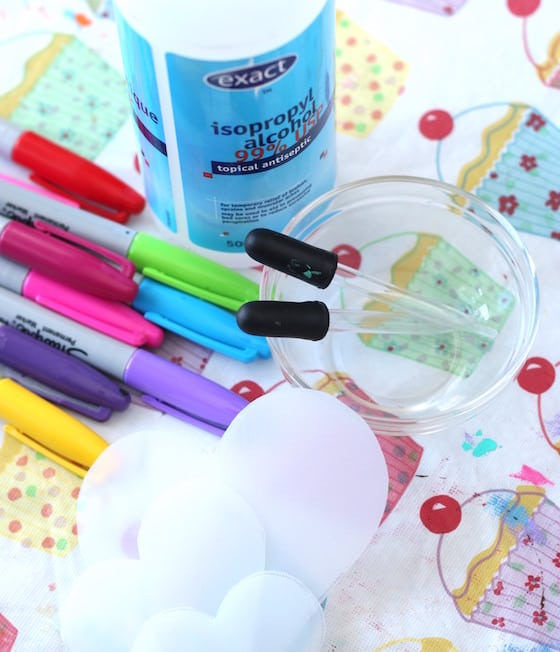 sharpies, 99% rubbing alcohol, hearts cut out of plastic vinegar container