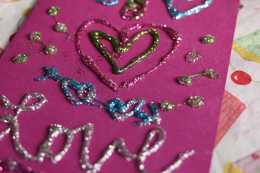 3-D designs made with glue guns and glitter