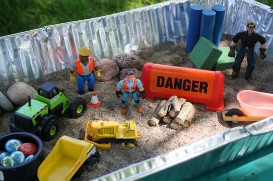 Construction Site Sensory Bin in a foil roasting pan