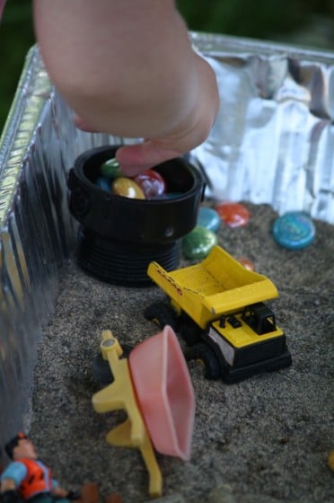 beads and pvc pipe in construction bin 