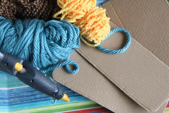 yarn, cardboard and glue gun