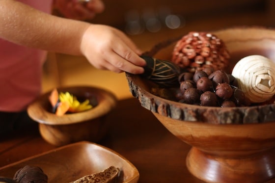 wooden bowls for sorting into on a fall sensory table