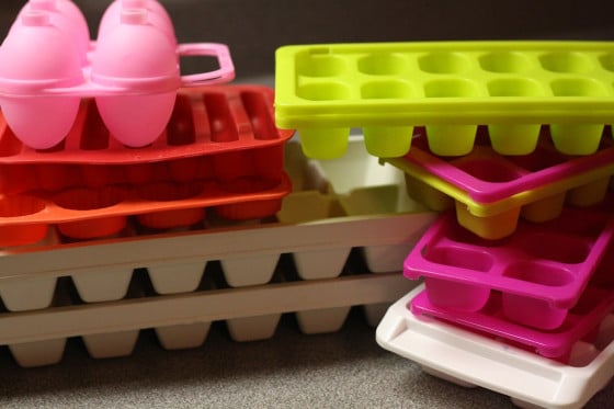 various ice trays and storage containers for making coloured ice cubes