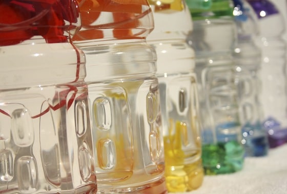 I spy bottles lined up in rainbow order