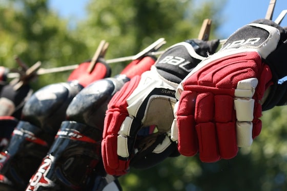 hockey gloves washed in the machine and drying on the line