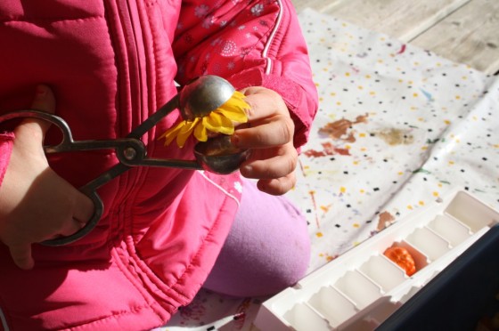 Toddler tongs and artificial sun flower