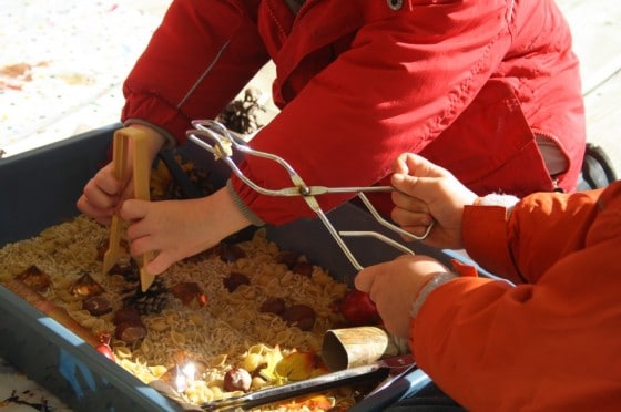 Toddler and Preschooler exploring November Sensory Bin