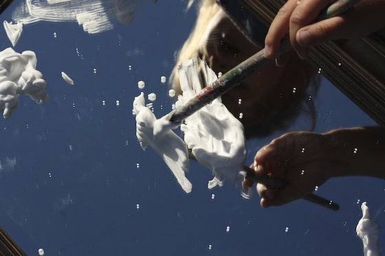 painting clouds on a mirror