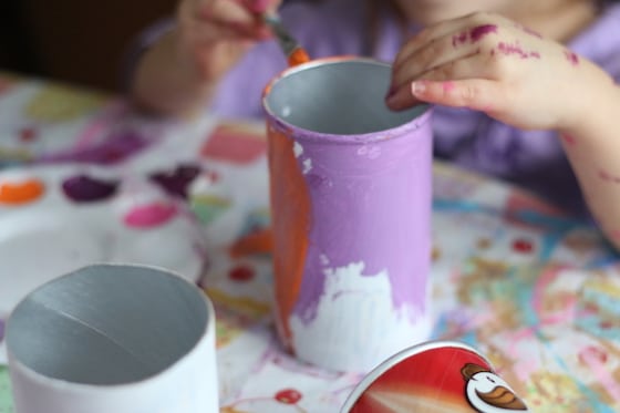 child painting Pringles can