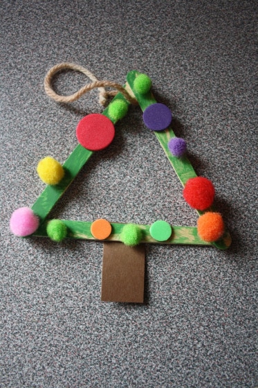 Toddler Made Christmas Tree with popsicle sticks and pom poms