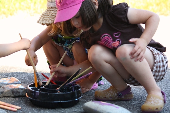 preschoolers painting rocks