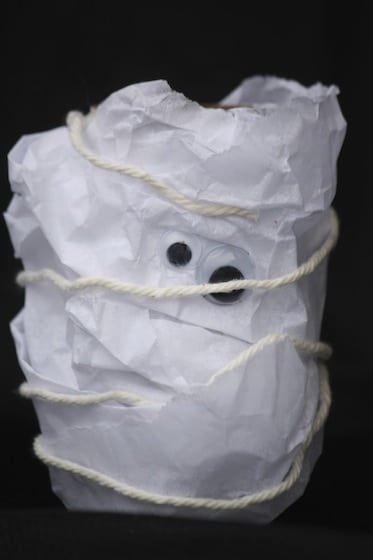 toilet roll mummy wrapped tissue paper and yarn