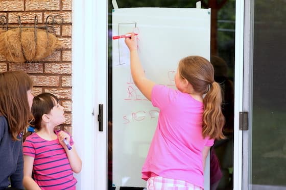 dry erase hangman on a glass door