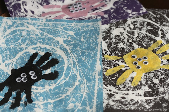 3 hand print spiders and webs painted with golf balls