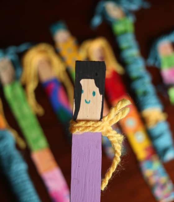 Paint stick doll with painted