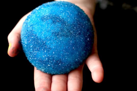 large beach stone covered with blue borax crystals