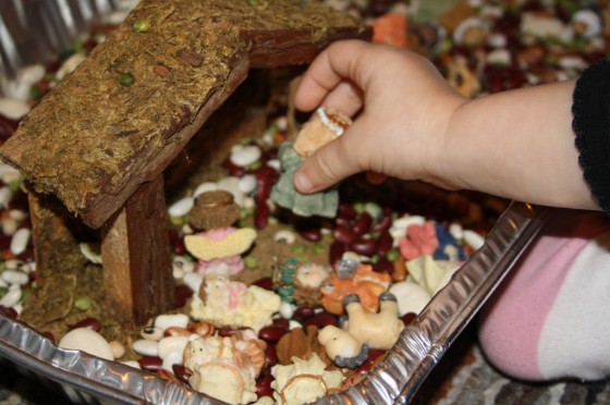 Nativity figures in a sensory bin