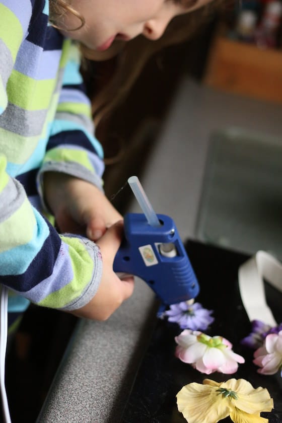 preschooler using low-heat glue gun