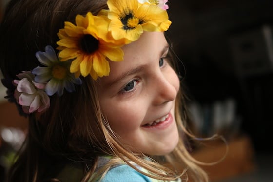 child wearing flowered tiara