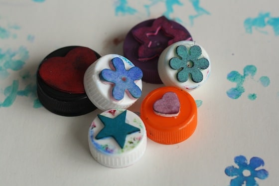 bottle tops with foam shapes glued on