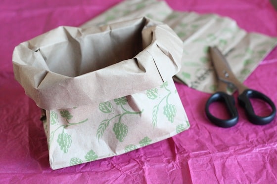 folding down edges of paper bag to make birds nest craft