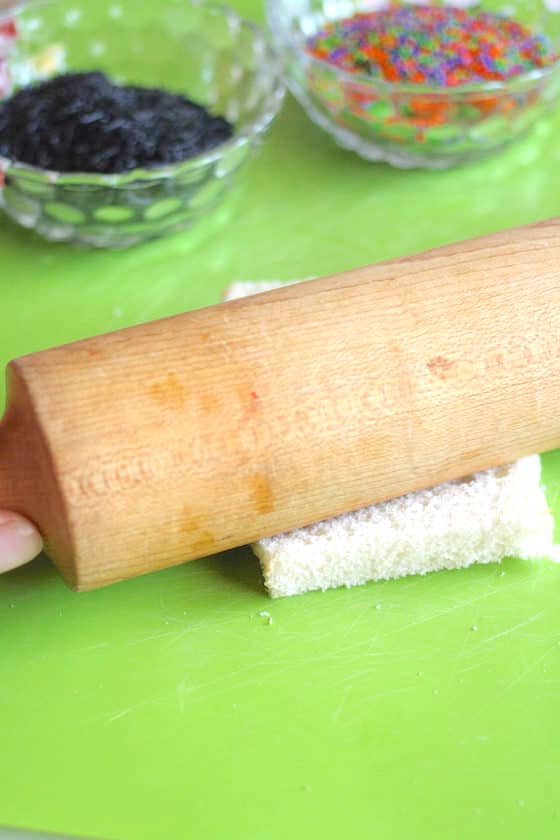 rolling bread flat with rolling pin