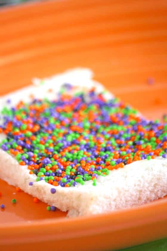 Buttered white bread topped with sprinkles