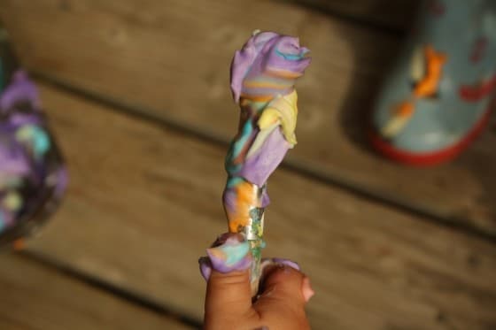 coloured shaving cream on paintbrush