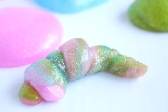 Homemade Pink, blue and green Elmers Glue Unicorn Poop Slime