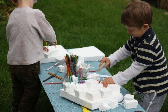 preschool boys constructing with styrofoam - pretend play