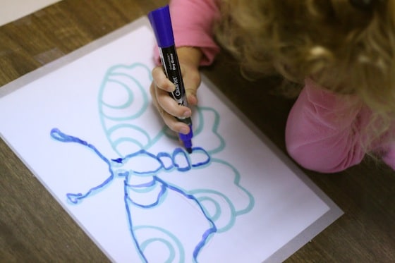 preschooler tracing butterfly 