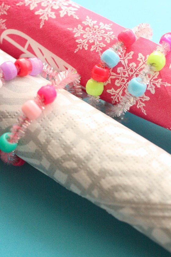 2 homemade holiday napkin rings made by toddlers