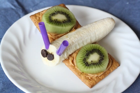 Banana Graham cracker butter fly snack with kiwi