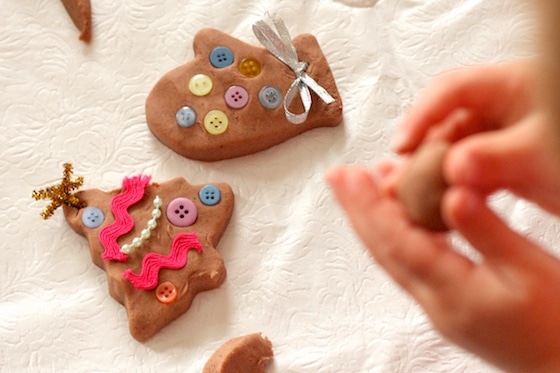 Decorating gingerbread playdough cookies