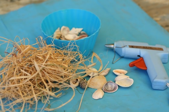 painted paper bag, glue gun, shells, raffia