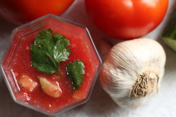 glass of homemade gazpacho with garlic and tomatoes