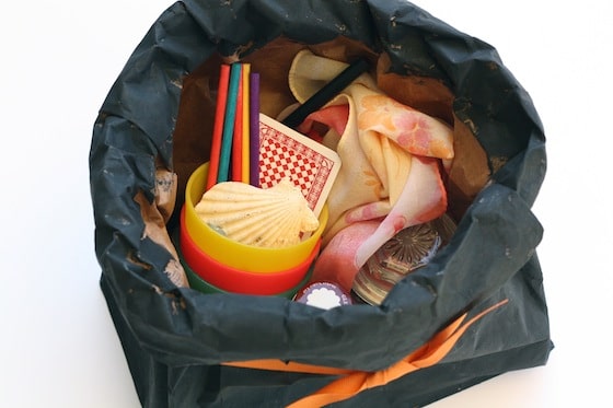 Paper bag magician hat filled with toys for tricks