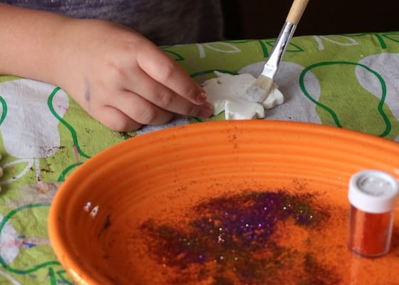 brushing clay dough leaf with white glue