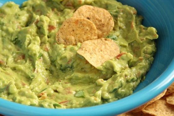 homemade guacamole in blue bowl