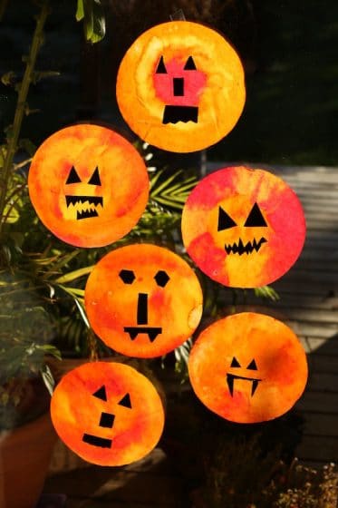 coffee filter suncatchers for toddlers and preschoolers to make for Halloween