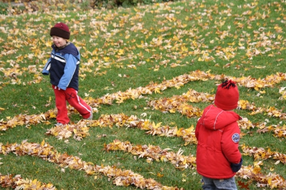 leaf maze, kids walking