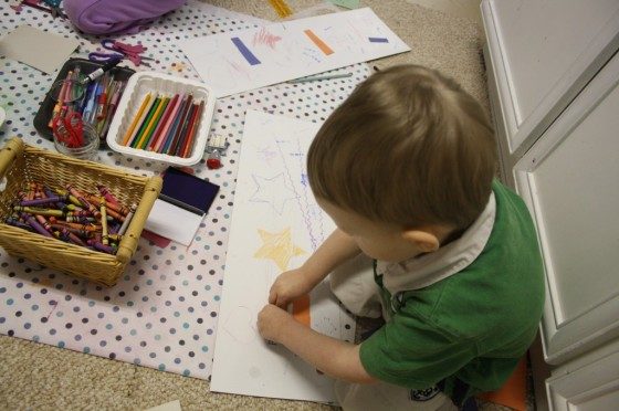 toddler stamping on paper