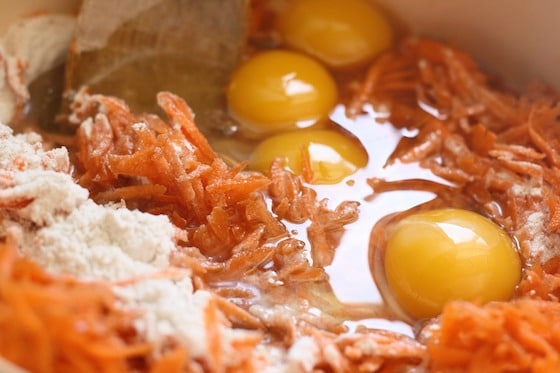 eggs, flour and carrots being mixed for the world's best carrot cake