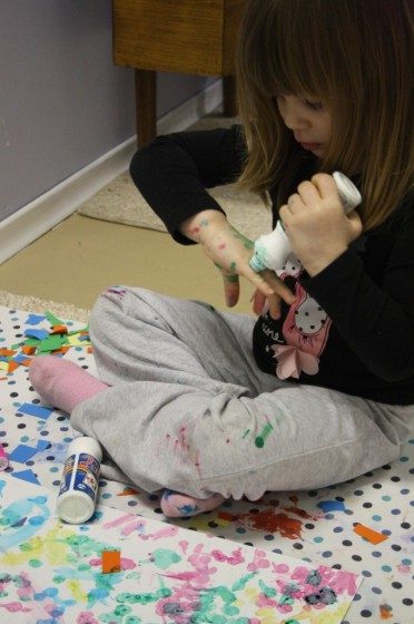 preschooler using ink dabbers