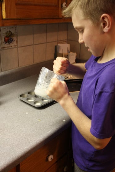 child making homemade watercolour paint