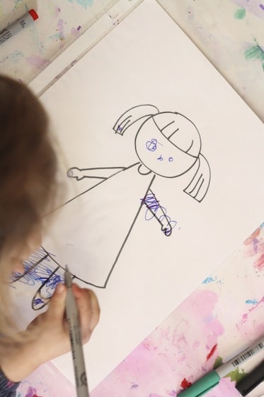 toddler drawing on plastic page protector 