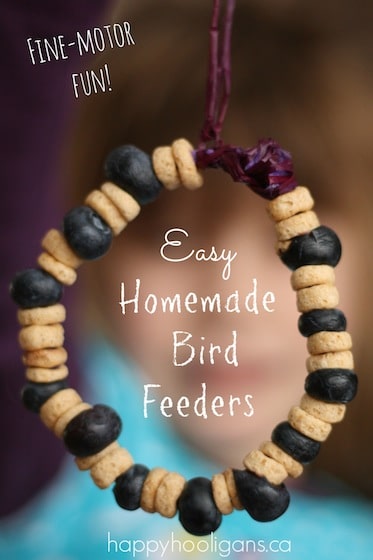 Homemade bird feeders with cheerios and blueberries